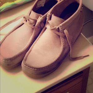 A pair of Size 10 Clark Stinson Hi Chukka Boots 10